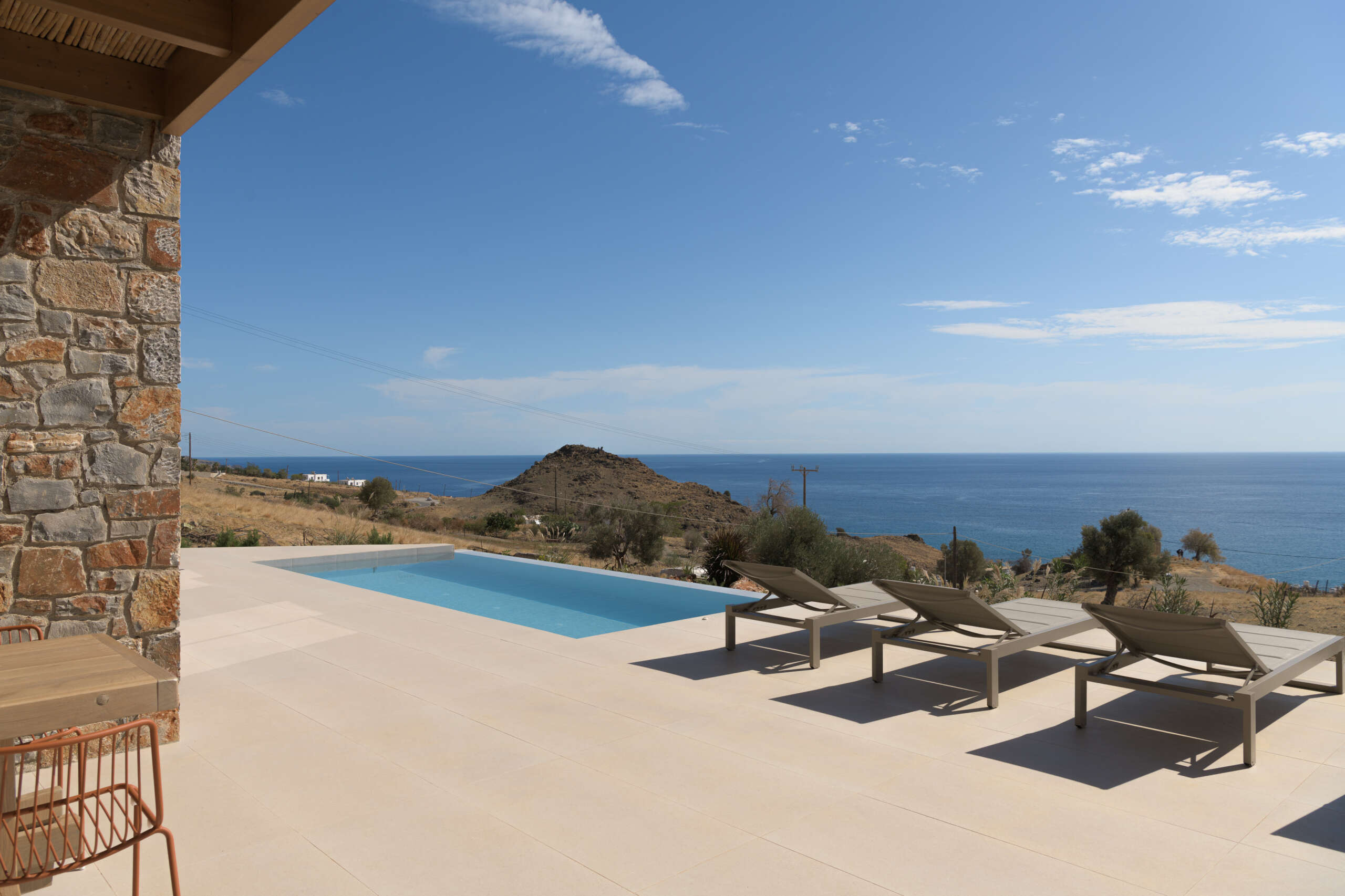 Welcome to Kyma Villa, where serene landscapes meet luxurious comforts.