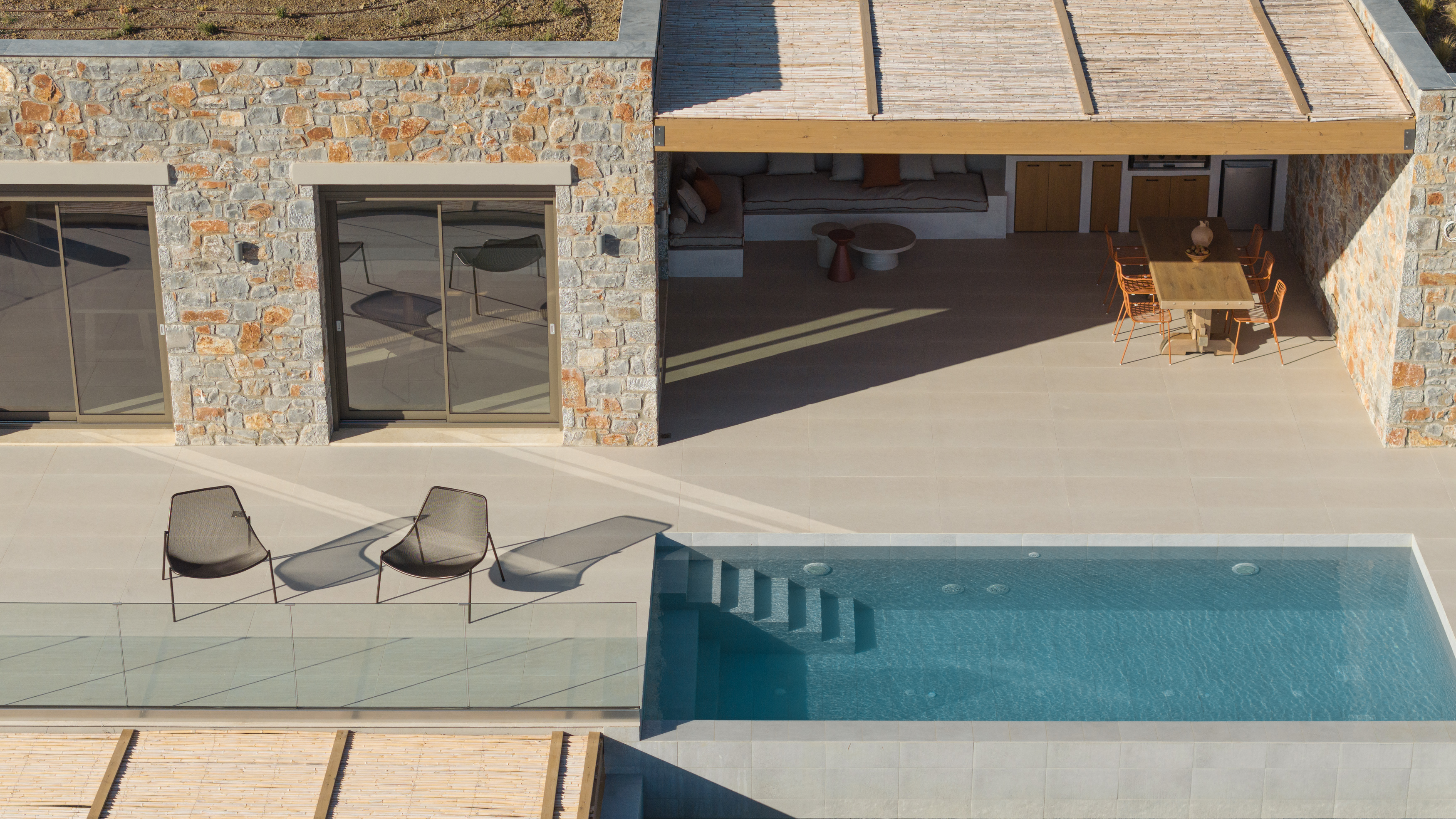 Sophisticated pool surroundings offering a sense of tranquility.