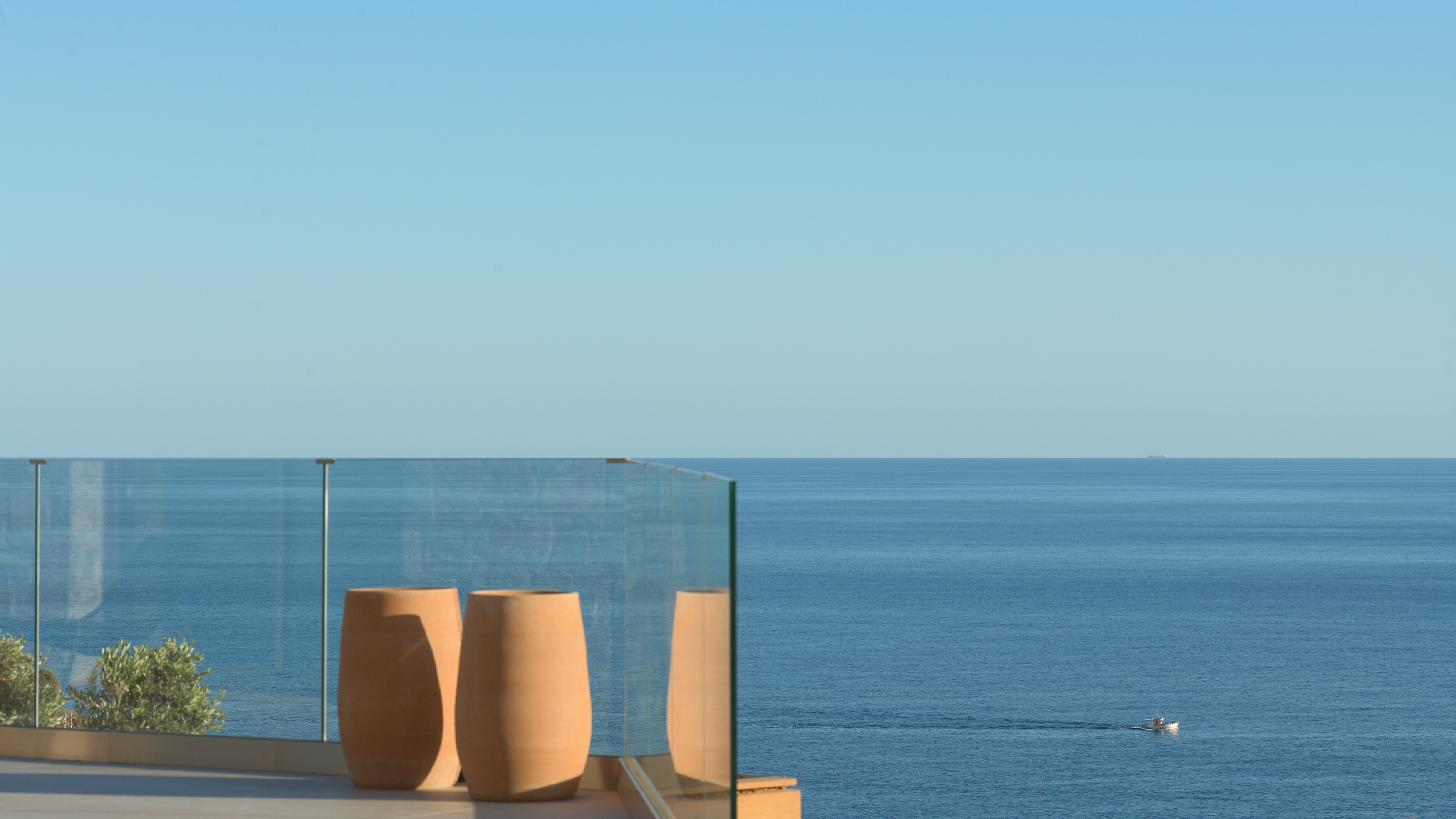 Endless blue horizons and serene moments await, offering the ultimate coastal escape.