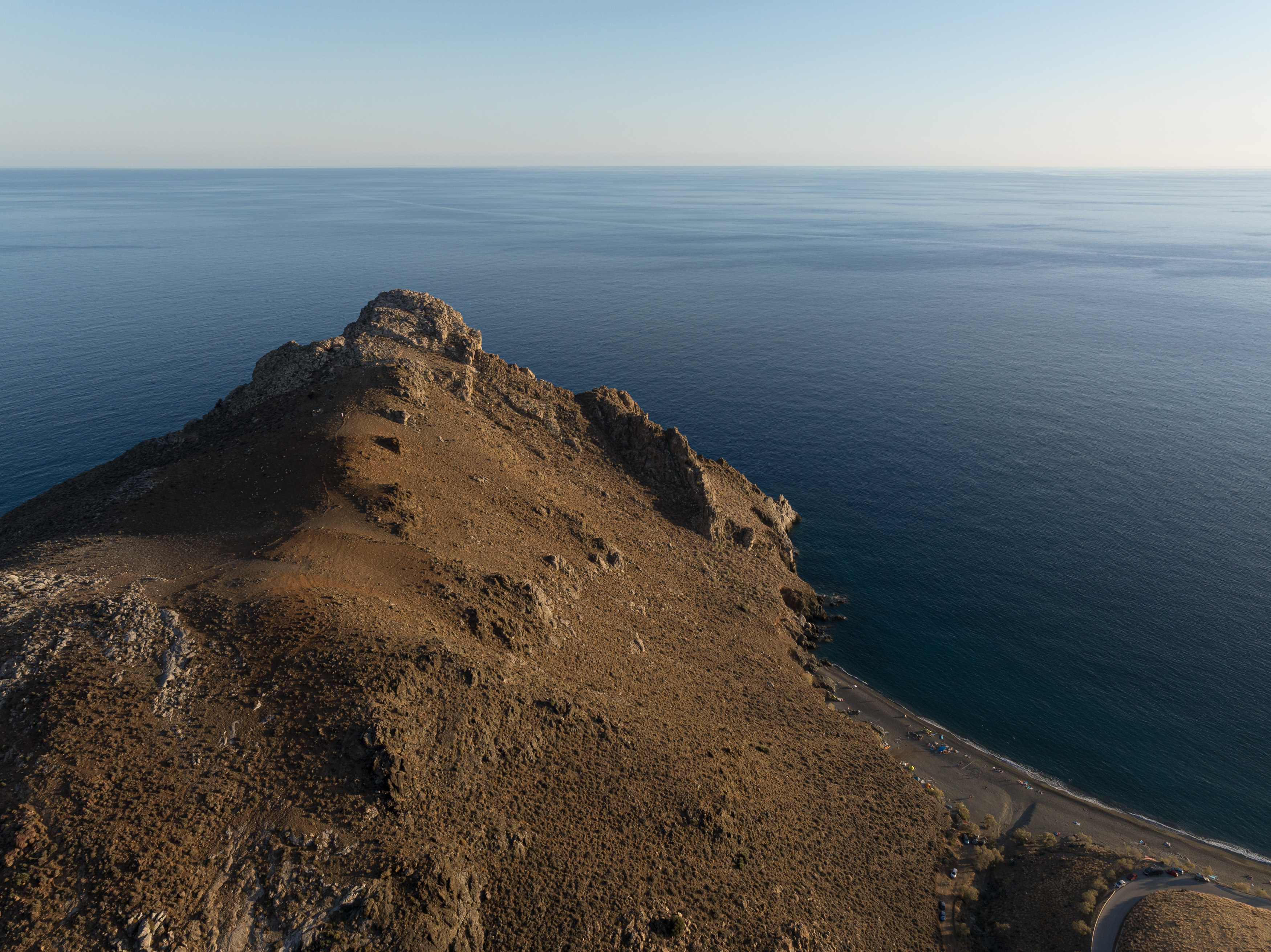 Where majestic mountains meet the endless sea.