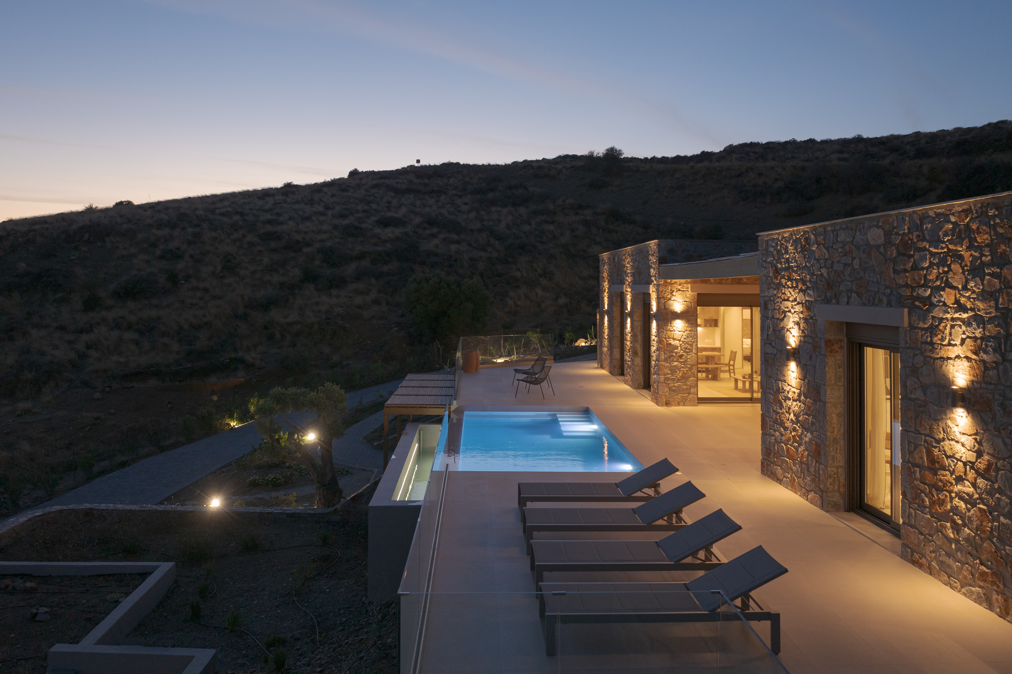 Stunning sunset views by the pool as the day fades away.